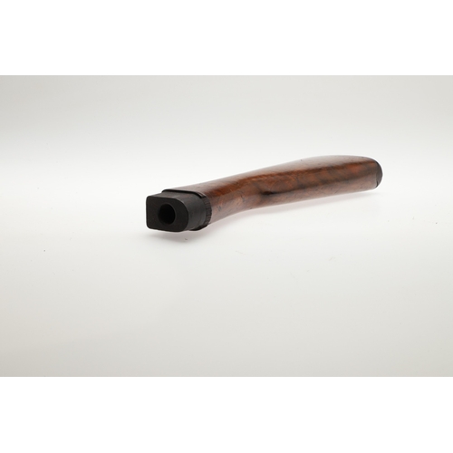 71 - A WALNUT RIFLE STOCK. A stock for a rifle with steel butt plate and small circular depression to the... 