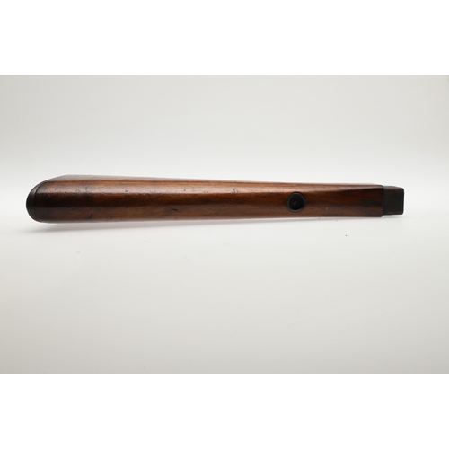 71 - A WALNUT RIFLE STOCK. A stock for a rifle with steel butt plate and small circular depression to the... 