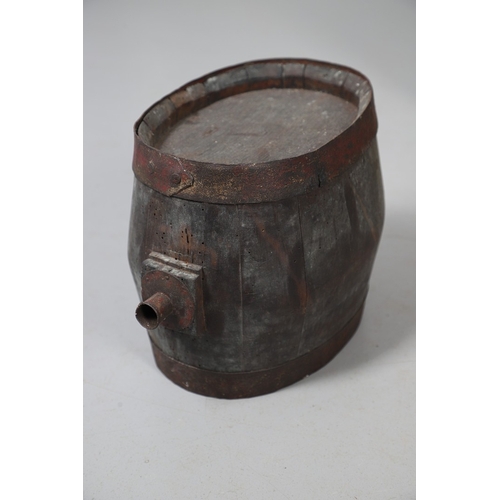 73 - A COLLECTION OF POWDER OR SIMILAR BARRELS AND A BRASS MOUNTED POWDER FLASK. A collection of bound ba... 