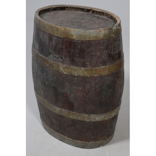 73 - A COLLECTION OF POWDER OR SIMILAR BARRELS AND A BRASS MOUNTED POWDER FLASK. A collection of bound ba... 