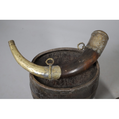 73 - A COLLECTION OF POWDER OR SIMILAR BARRELS AND A BRASS MOUNTED POWDER FLASK. A collection of bound ba... 
