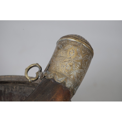 73 - A COLLECTION OF POWDER OR SIMILAR BARRELS AND A BRASS MOUNTED POWDER FLASK. A collection of bound ba... 