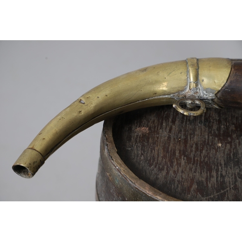 73 - A COLLECTION OF POWDER OR SIMILAR BARRELS AND A BRASS MOUNTED POWDER FLASK. A collection of bound ba... 