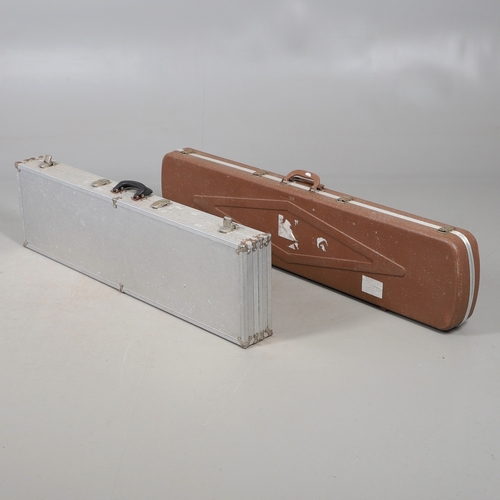 75 - TWO SIMILAR GUN CASES. Two similar hard-shell gun cases with foam lined interiors. 132 x 30 x 11 cm ... 