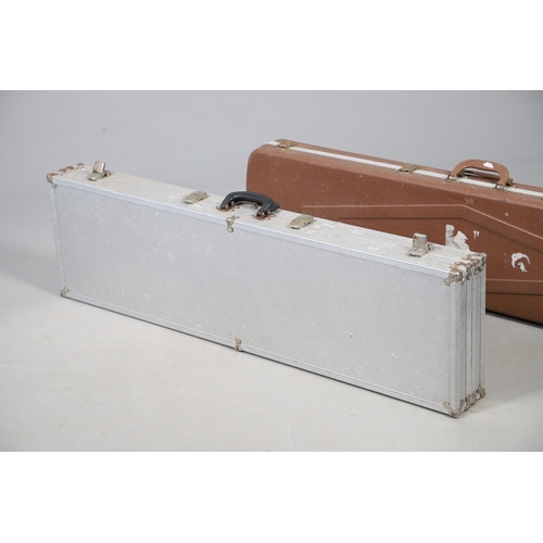 75 - TWO SIMILAR GUN CASES. Two similar hard-shell gun cases with foam lined interiors. 132 x 30 x 11 cm ... 