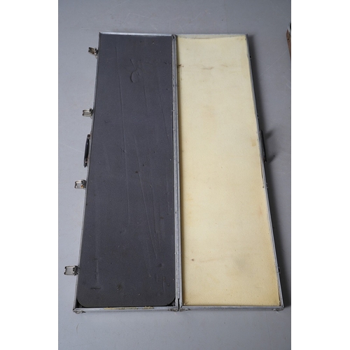 75 - TWO SIMILAR GUN CASES. Two similar hard-shell gun cases with foam lined interiors. 132 x 30 x 11 cm ... 
