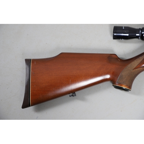 76 - A WEIHRAUCH HW 77 .22 AIR RIFLE. A .22 air rifle with a 39.5 cm barrel, variously stamped: Weihrauch... 
