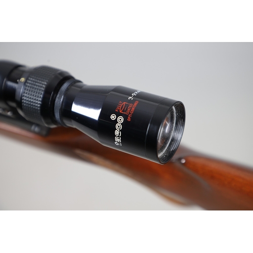 76 - A WEIHRAUCH HW 77 .22 AIR RIFLE. A .22 air rifle with a 39.5 cm barrel, variously stamped: Weihrauch... 