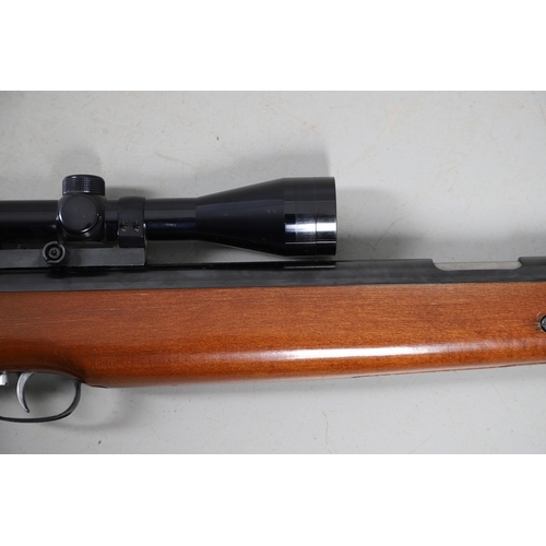 76 - A WEIHRAUCH HW 77 .22 AIR RIFLE. A .22 air rifle with a 39.5 cm barrel, variously stamped: Weihrauch... 