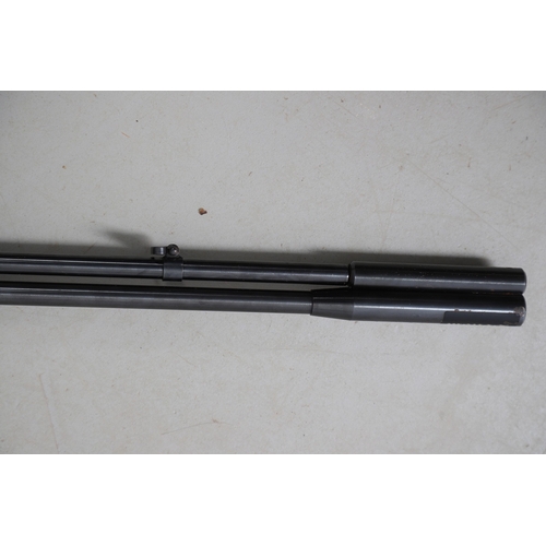 76 - A WEIHRAUCH HW 77 .22 AIR RIFLE. A .22 air rifle with a 39.5 cm barrel, variously stamped: Weihrauch... 