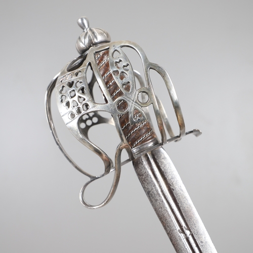 84 - AN 18TH CENTURY SCOTTISH BASKET HILTED SWORD BY ANDREA FERRARA. With an 88 cm tapering broad blade w... 