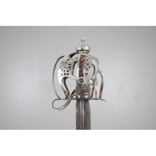 84 - AN 18TH CENTURY SCOTTISH BASKET HILTED SWORD BY ANDREA FERRARA. With an 88 cm tapering broad blade w... 