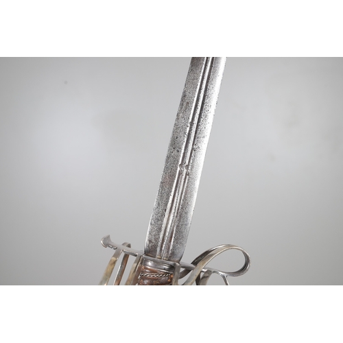 84 - AN 18TH CENTURY SCOTTISH BASKET HILTED SWORD BY ANDREA FERRARA. With an 88 cm tapering broad blade w... 