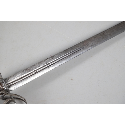 84 - AN 18TH CENTURY SCOTTISH BASKET HILTED SWORD BY ANDREA FERRARA. With an 88 cm tapering broad blade w... 