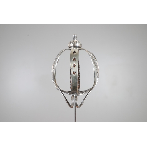 84 - AN 18TH CENTURY SCOTTISH BASKET HILTED SWORD BY ANDREA FERRARA. With an 88 cm tapering broad blade w... 