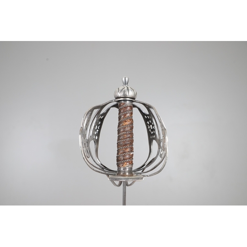 84 - AN 18TH CENTURY SCOTTISH BASKET HILTED SWORD BY ANDREA FERRARA. With an 88 cm tapering broad blade w... 