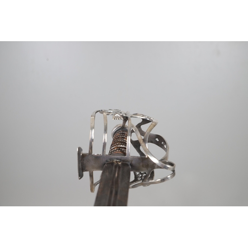 84 - AN 18TH CENTURY SCOTTISH BASKET HILTED SWORD BY ANDREA FERRARA. With an 88 cm tapering broad blade w... 