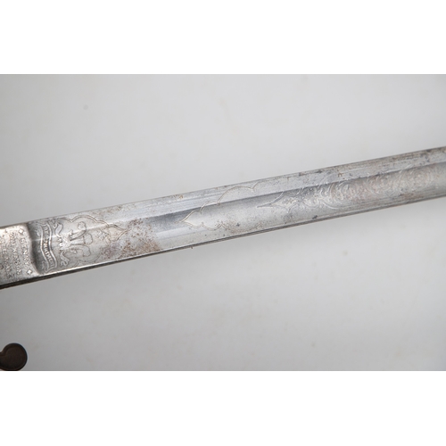 86 - A VICTORIAN 1821 PATTERN SWORD AND SCABBARD BY HENRY WILKINSON. With a well decorated 88 cm pointed,... 