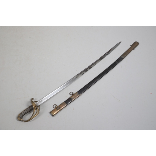 92 - A GEORGE IV 1822 PATTERN INFANTRY OFFICER'S SWORD AND SCABBARD. The 77.5 cm pipe-backed, spear-point... 