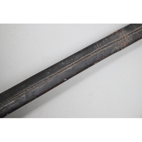 96 - A VICTORIAN 1854 PATTERN SWORD AND SCABBARD. An 1854 pattern sword with an 82 cm tapering, pointed p... 