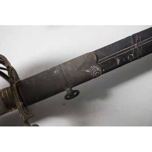 96 - A VICTORIAN 1854 PATTERN SWORD AND SCABBARD. An 1854 pattern sword with an 82 cm tapering, pointed p... 