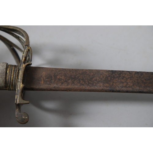 96 - A VICTORIAN 1854 PATTERN SWORD AND SCABBARD. An 1854 pattern sword with an 82 cm tapering, pointed p... 