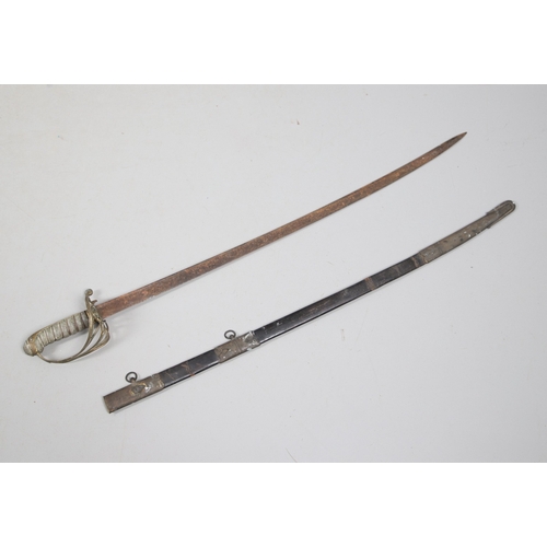 96 - A VICTORIAN 1854 PATTERN SWORD AND SCABBARD. An 1854 pattern sword with an 82 cm tapering, pointed p... 