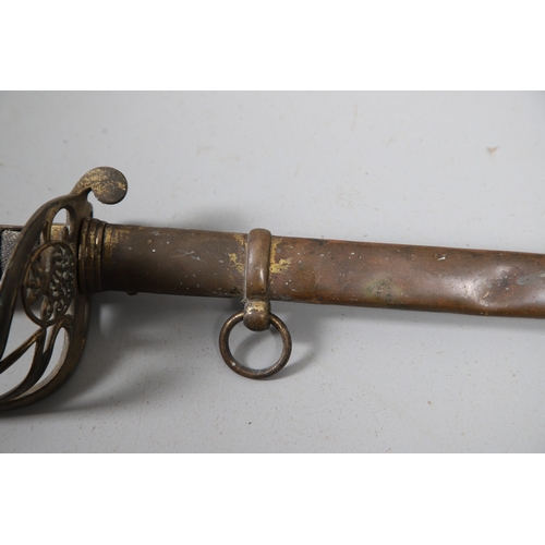 98 - A VICTORIAN 1854 PATTERN SWORD AND SCABBARD BY CATER AND CO. An 1854 pattern sword with an 83 cm sle... 
