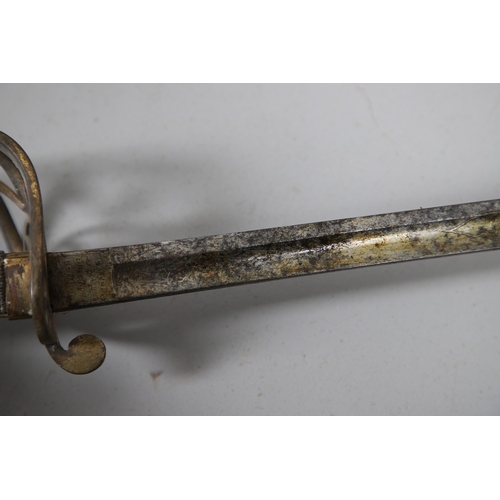 98 - A VICTORIAN 1854 PATTERN SWORD AND SCABBARD BY CATER AND CO. An 1854 pattern sword with an 83 cm sle... 