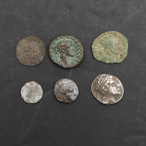 1005 - A SMALL COLLECTION OF ANCIENT COINS INCLUDING A GREEK COIN FROM RHODES AND OTHERS. A Greek coin, bus... 