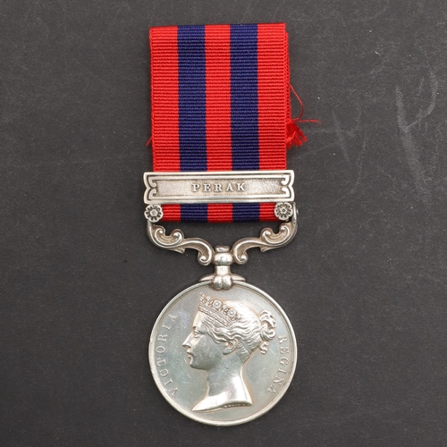 820 - AN INDIAN GENERAL SERVICE MEDAL WITH PERAK CLASP TO H.M.S. CHARYBDIS. An India medal 1849-95 with Pe... 
