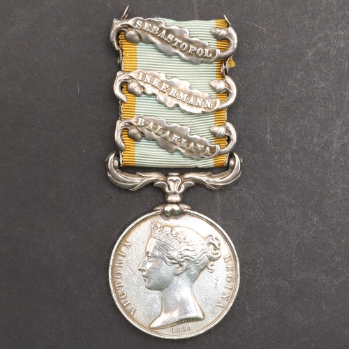 826 - A THREE CLASP CRIMEA WAR MEDAL TO A 5TH DRAGOON GUARDS CHARGER WITH THE HEAVY BRIGADE. A Crimea 1854... 