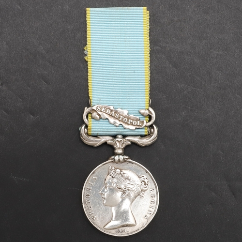 827 - A CRIMEA MEDAL WITH SEBASTOPOL CLASP TO THE 11TH HUSSARS. A Crimea 1854 medal with Sebastopol clasp ... 