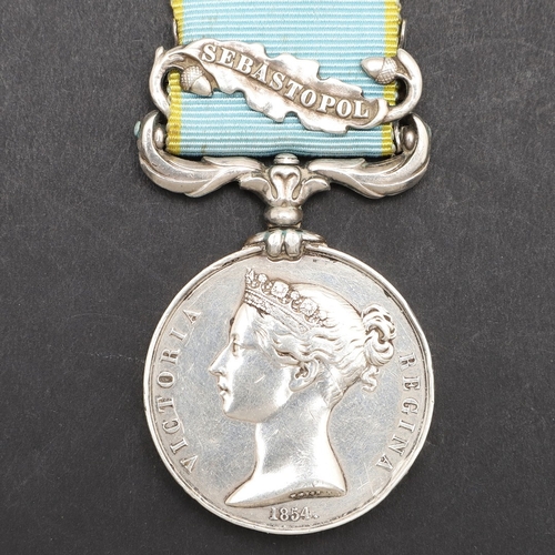 827 - A CRIMEA MEDAL WITH SEBASTOPOL CLASP TO THE 11TH HUSSARS. A Crimea 1854 medal with Sebastopol clasp ... 