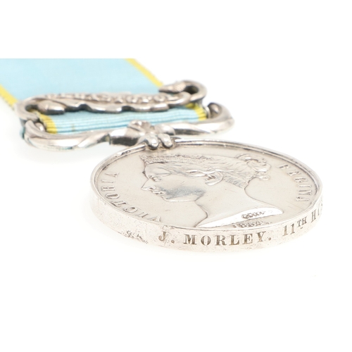 827 - A CRIMEA MEDAL WITH SEBASTOPOL CLASP TO THE 11TH HUSSARS. A Crimea 1854 medal with Sebastopol clasp ... 