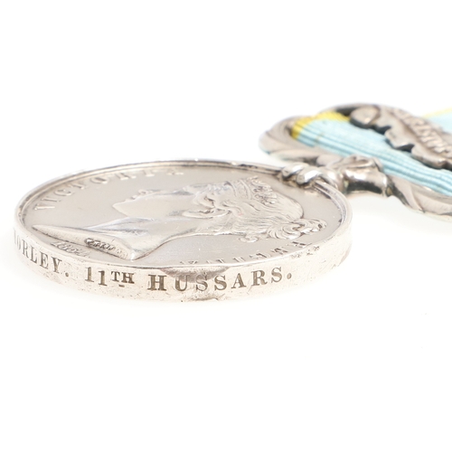 827 - A CRIMEA MEDAL WITH SEBASTOPOL CLASP TO THE 11TH HUSSARS. A Crimea 1854 medal with Sebastopol clasp ... 