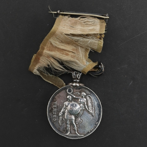 828 - A RARE CRIMEA MEDAL WITHOUT CLASP AWARDED TO A DRESSER WITH THE OTTOMAN MEDICAL STAFF. A Crimea Meda... 