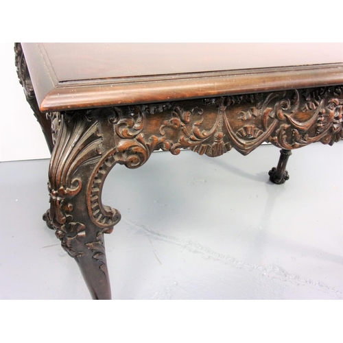 25 - A FINE 19TH CENTURY RECTANGULAR TOP TABLE, PROBABLY IRISH, HAVING A HEAVILY CARVED FRIEZE CENTRED WI... 