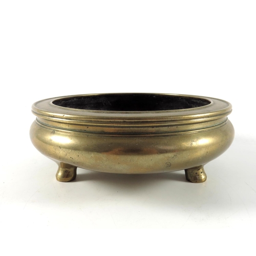450 - ORIENTAL POLISHED BRONZE CENSER APPROX 16.5CMS DIAMETER RAISED ON 3 FEET OVERALL HEIGHT APPROX. 5.5C... 