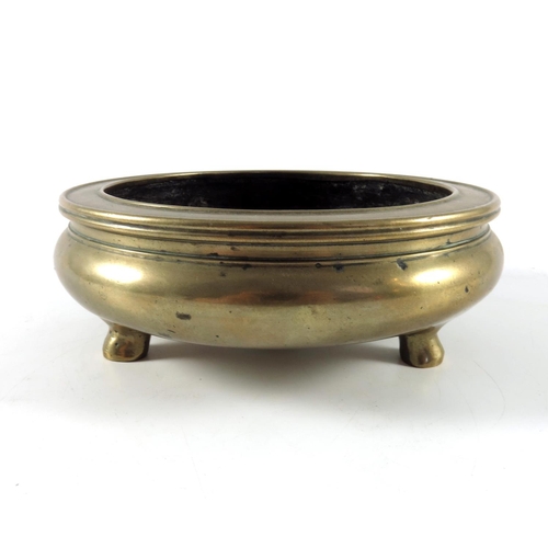 450 - ORIENTAL POLISHED BRONZE CENSER APPROX 16.5CMS DIAMETER RAISED ON 3 FEET OVERALL HEIGHT APPROX. 5.5C... 