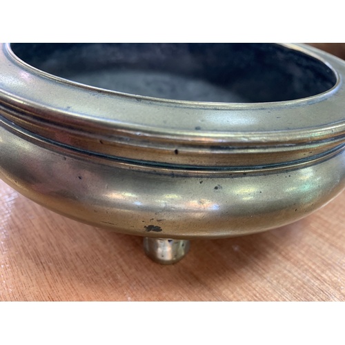 450 - ORIENTAL POLISHED BRONZE CENSER APPROX 16.5CMS DIAMETER RAISED ON 3 FEET OVERALL HEIGHT APPROX. 5.5C... 