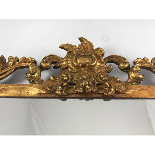 97 - GOOD QUALITY PIERCED GILT FRAMED MIRROR, APPROX. 88 X 68 cm