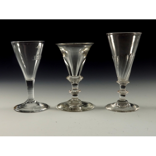 191 - 3 GEORGIAN GLASSES, A WINE GLASS WITH DOUBLE KNOP STEM, ANOTHER WITH ARMORIAL ENGRAVING AND ONE OTHE... 