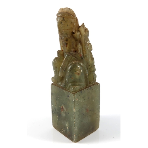 462 - CHINESE SQUARE FORM SEAL WITH FINIAL CARVED AS A SEATED SCHOLAR, APPROX. 9 cm H.