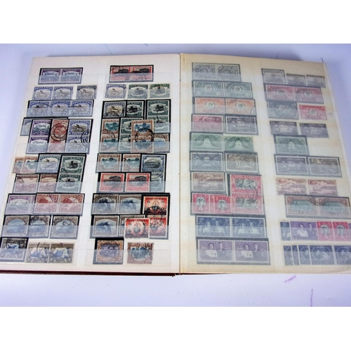 620 - BROWN STOCKBOOK BRITISH COMMONWEALTH ISSUES SOUTH AFRICA UGANDA RHODESIA NIGERIA SUDAN ETC PART SETS... 