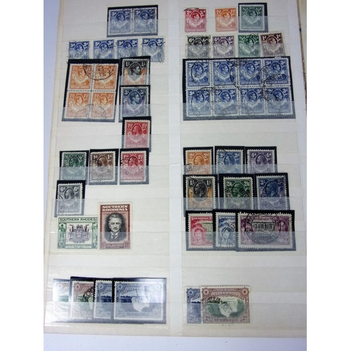 620 - BROWN STOCKBOOK BRITISH COMMONWEALTH ISSUES SOUTH AFRICA UGANDA RHODESIA NIGERIA SUDAN ETC PART SETS... 