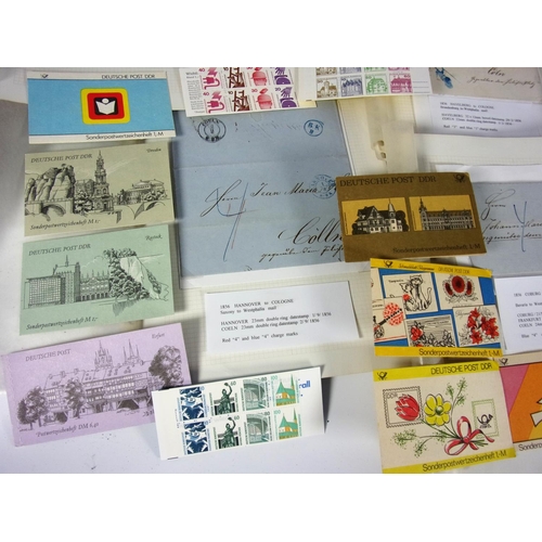 651 - STAMPS, GERMANY.  1980S  1990S.  12 EAST GERMAN STAMP BOOKLETS WITH 12 WEST GERMAN STAMP BOOKLETS, ... 