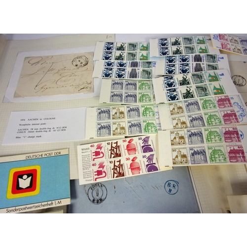 651 - STAMPS, GERMANY.  1980S  1990S.  12 EAST GERMAN STAMP BOOKLETS WITH 12 WEST GERMAN STAMP BOOKLETS, ... 