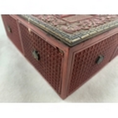 460 - AN INTRICATELY CARVED CHINESE CINNEBAR LACQUERED TREASURE BOX INCORPORATING DRAWERS, APPROX. 21 cm S... 