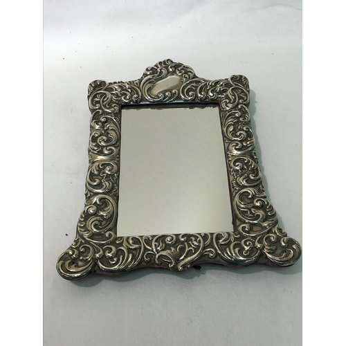 571 - EASEL TYPE MIRROR WITH DECORATIVE SILVER FRAME